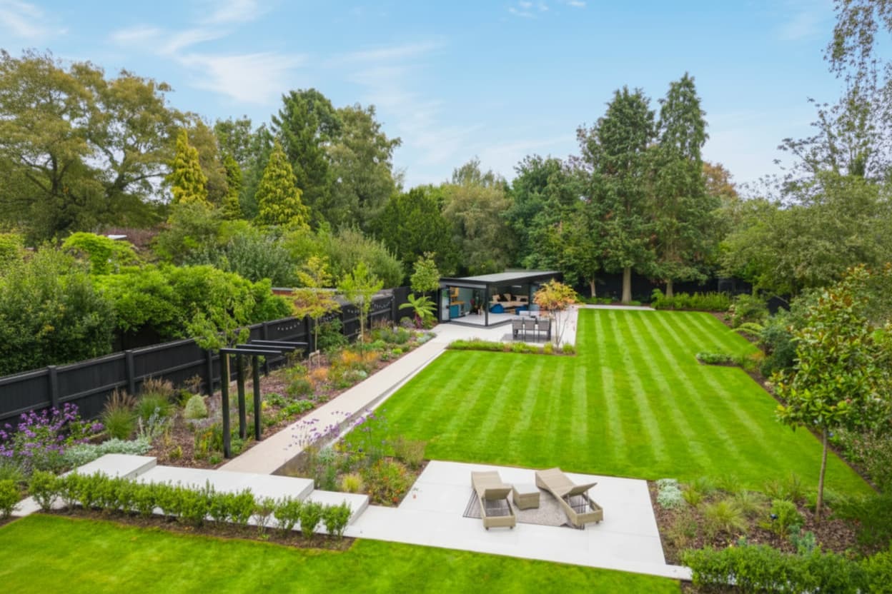 UK landscaped garden before natural swimming pool installation